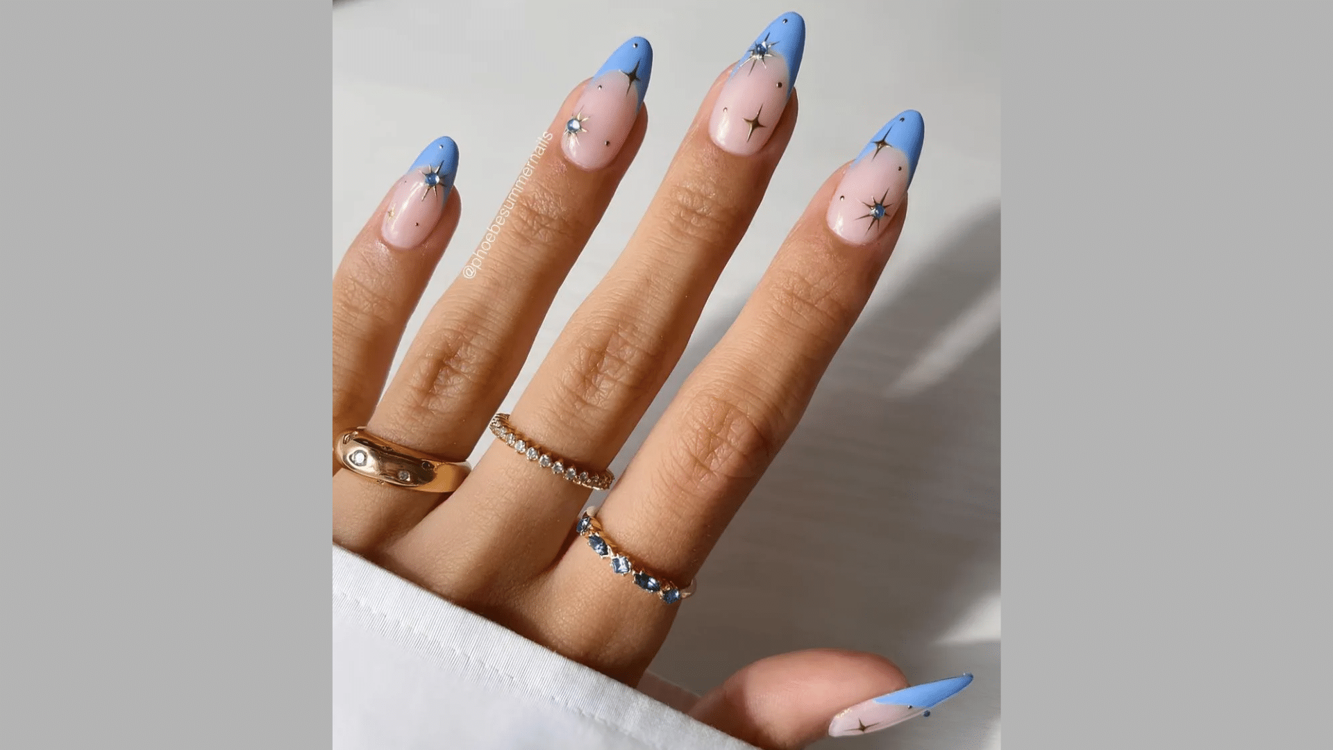 25. Sky Blue and Nude Split Nails