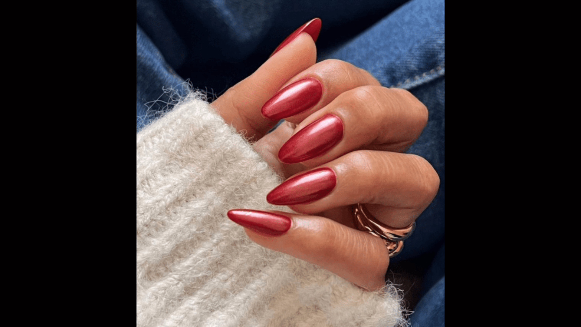 Deep red nails with chrome finish