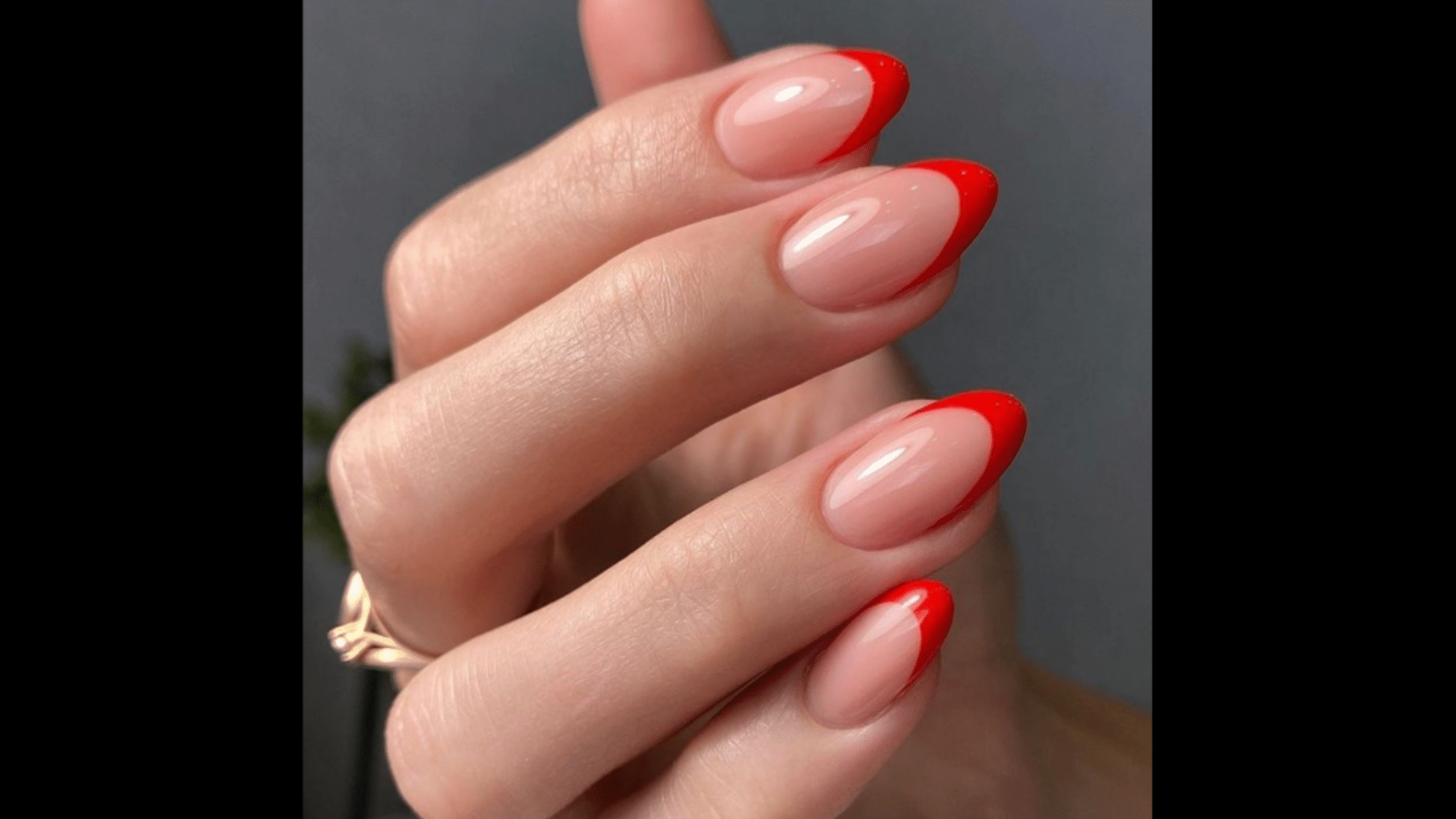 Red French tips on nude nails