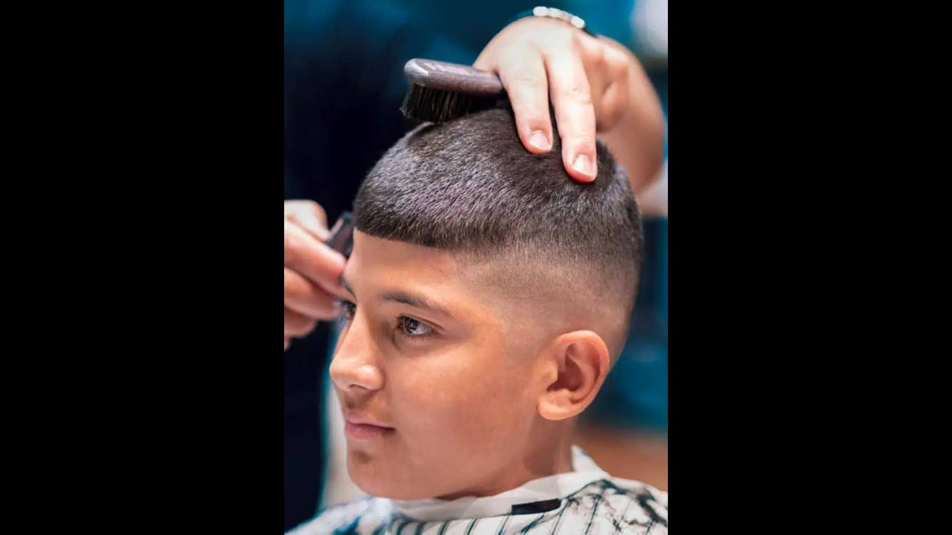 16. High Skin Fade Buzz Cut with Boxed Fringe