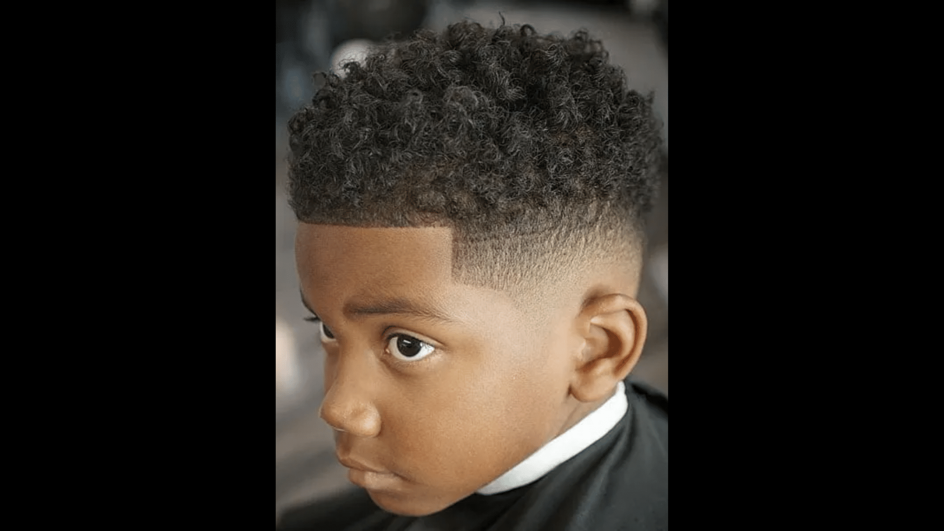 19. Curly Top High Fade