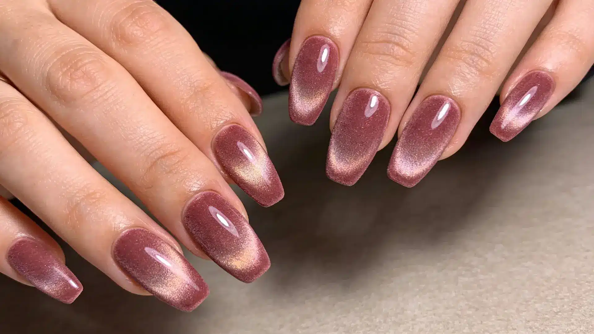 Velvet magnetic polish gives mauve nails a soft shimmer that shifts under light