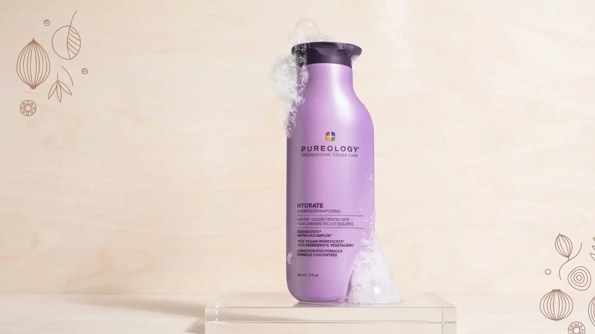 A purple Pureology Hydrate shampoo bottle on a glass pedestal, surrounded by white soap bubbles and line art icons