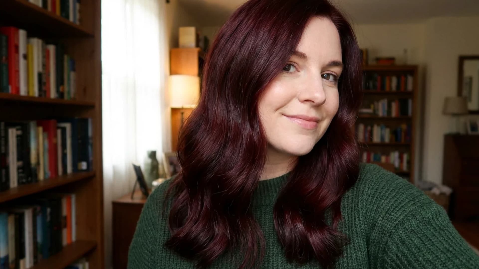Portrait of a woman with evenly colored hair in a single solid shade, smooth and uniform tone from roots to ends