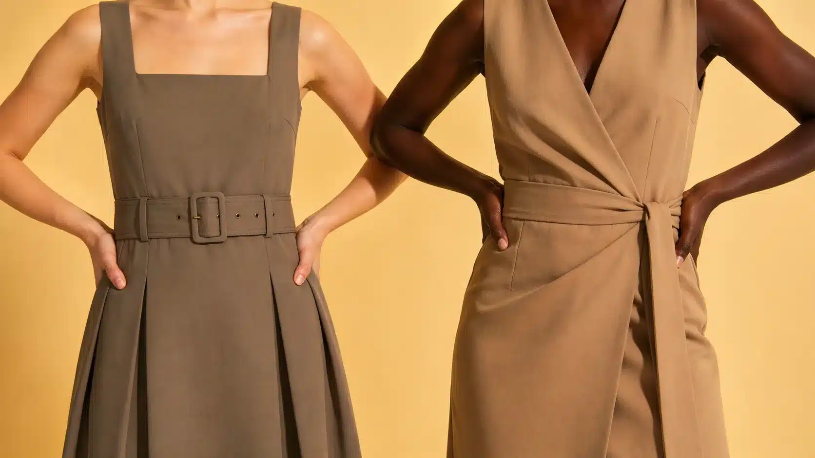 Women in belted and wrap dresses creating shape on a minimal studio background
