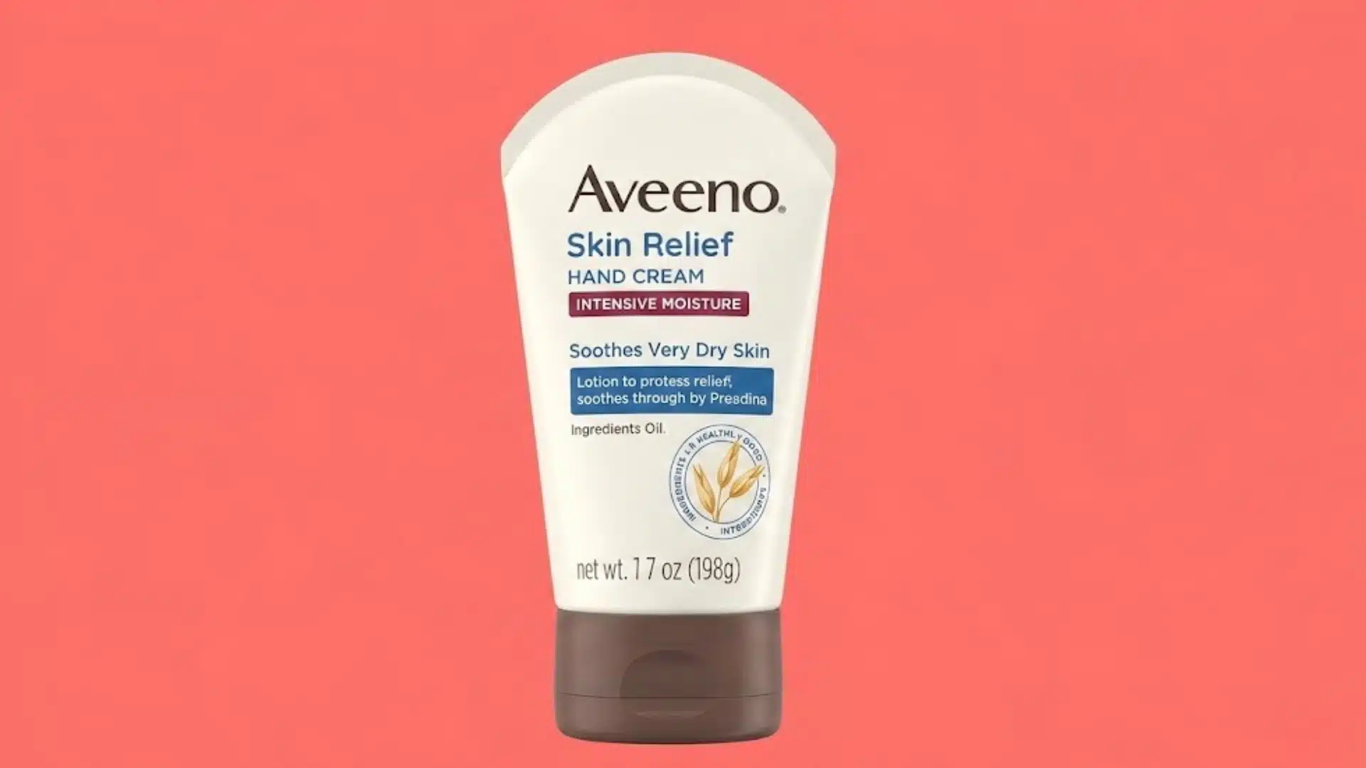 Aveeno Skin Relief Hand Cream tube for very dry skin on a coral background