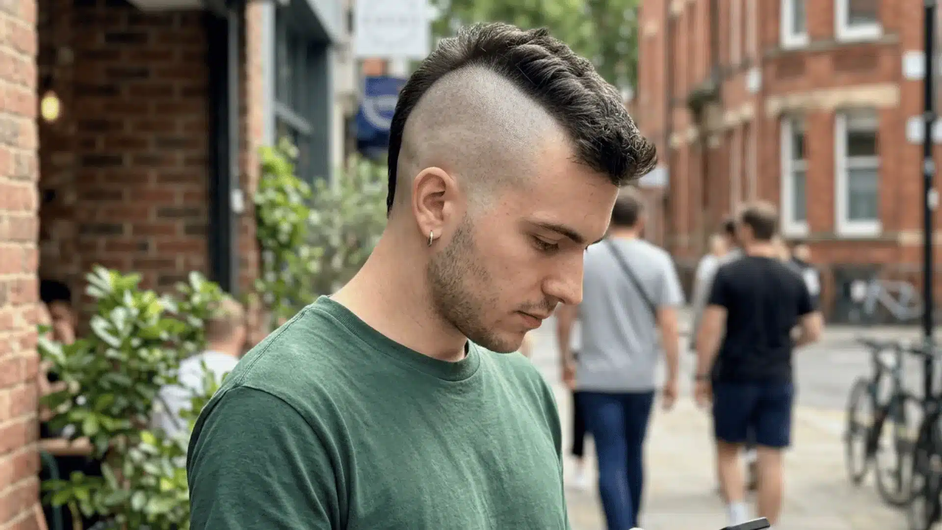 Clean zero fade mohawk on young man