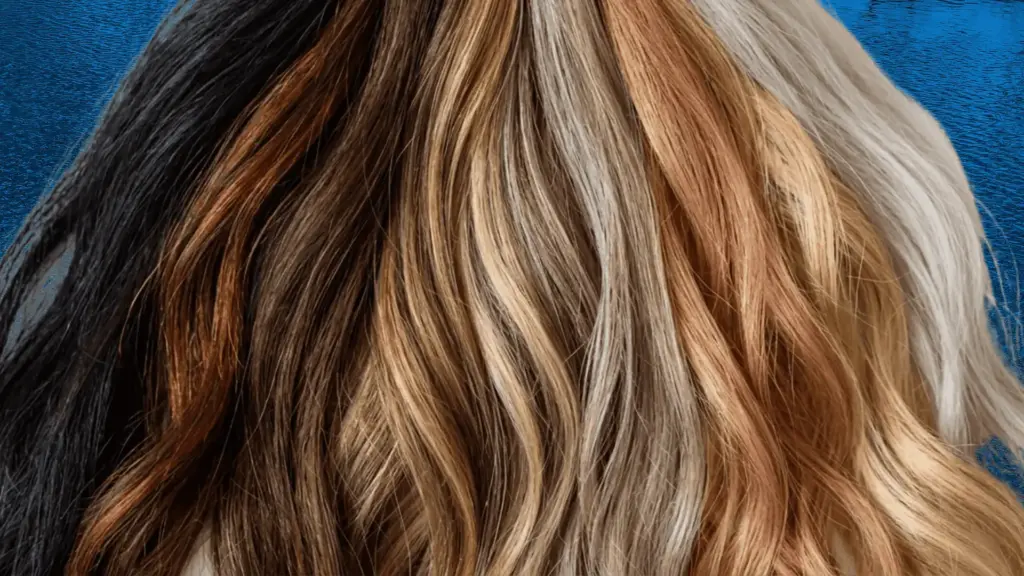 Different hair tones from black to blonde showing warm and cool undertones in hair color spectrum