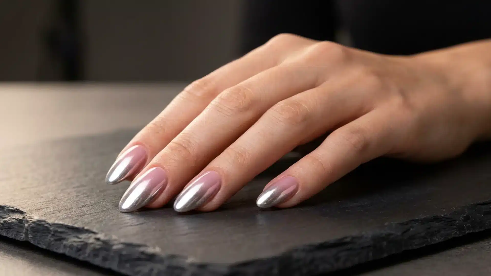 Gradient Chrome nails featuring nude pink base fading into reflective silver chrome