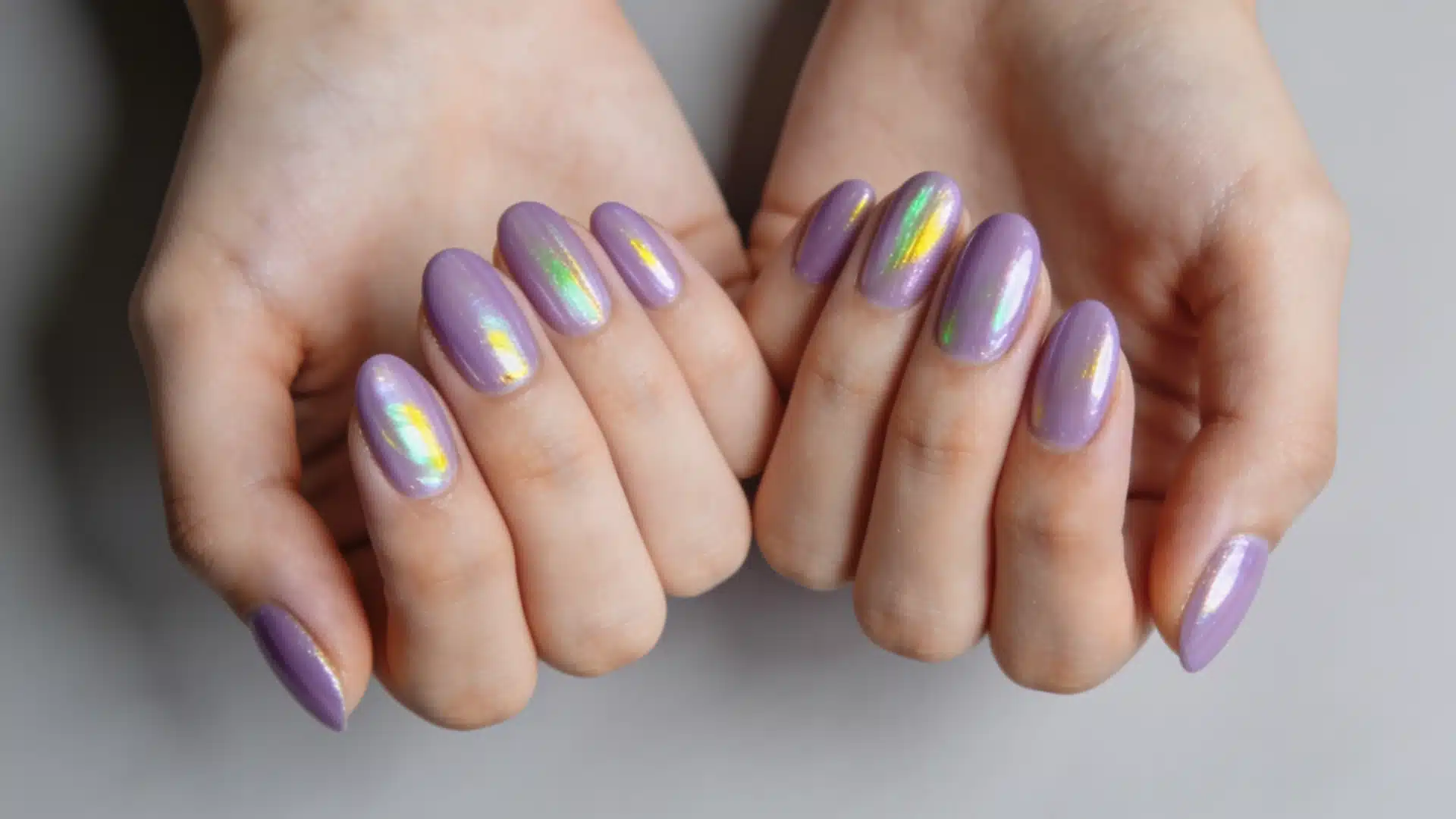 Lavender glazed almond nails with iridescent chrome shine