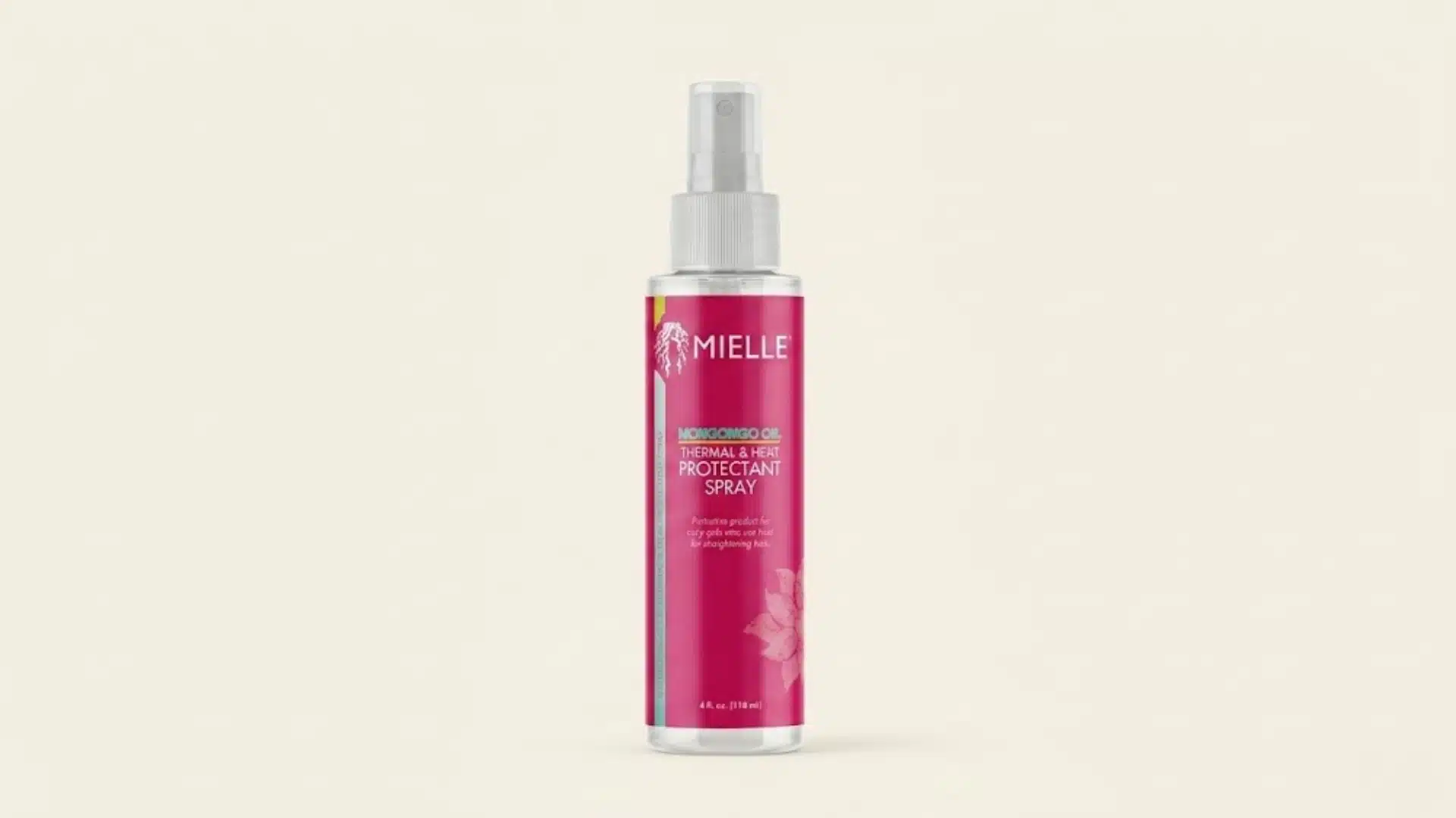 Mielle Mongongo Oil Thermal & Heat Protectant Spray bottle on a clean beige background with studio lighting
