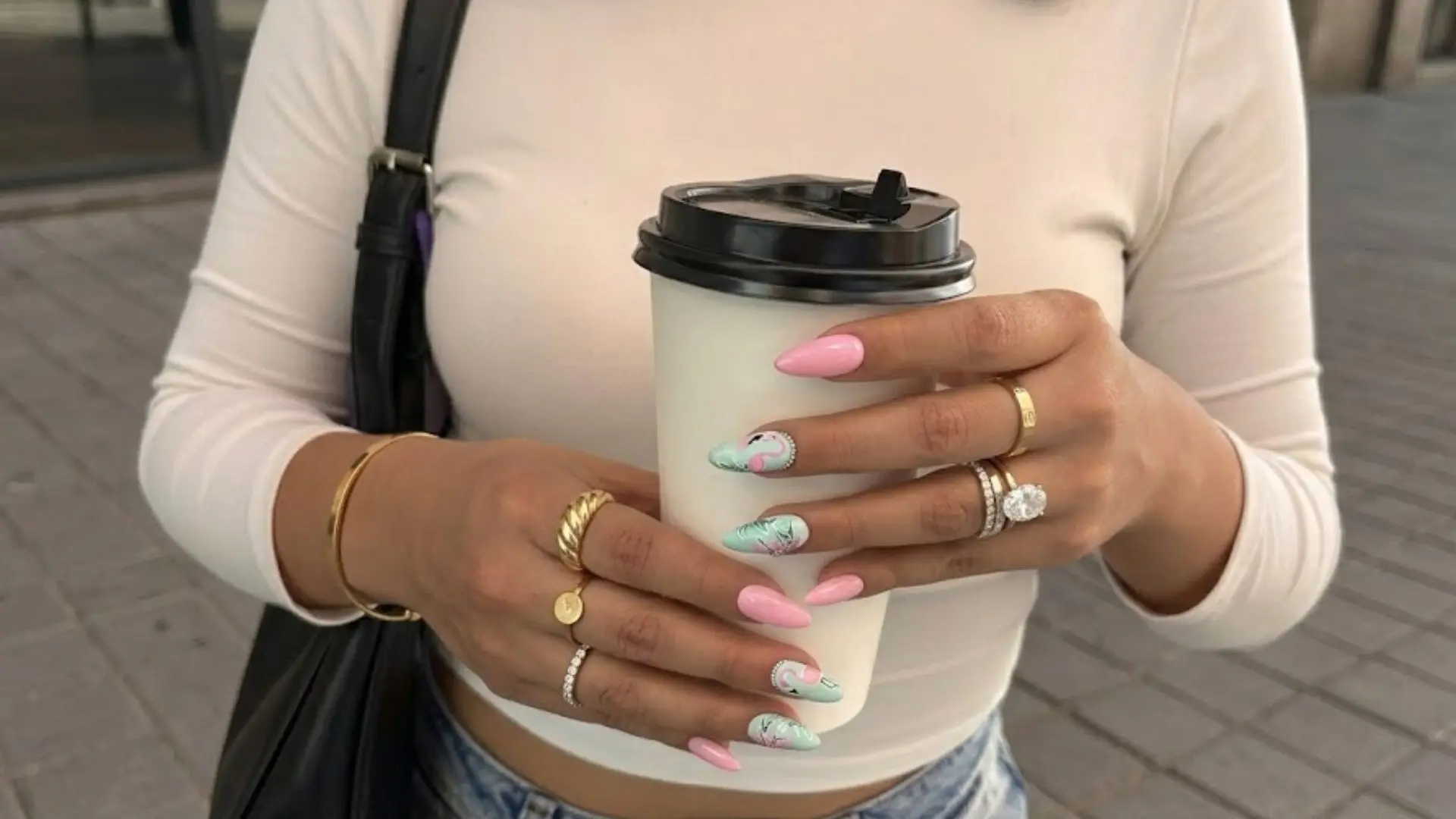 Mint green and pink swirl nails with flamingo design, pastel acrylic manicure with soft abstract nail art
