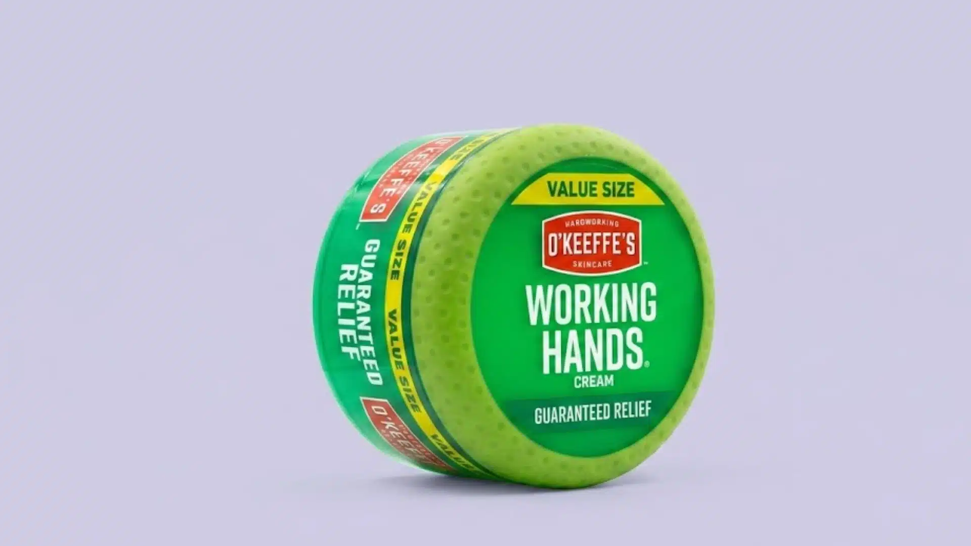 OKeeffe Working Hands cream in a green value size jar on a purple background