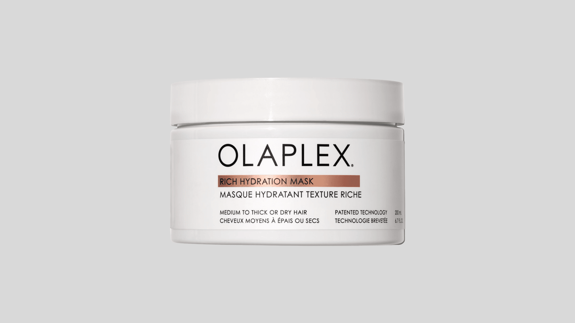 Olaplex Rich Hydration Mask jar on a plain gray background for dry, medium, and thick hair