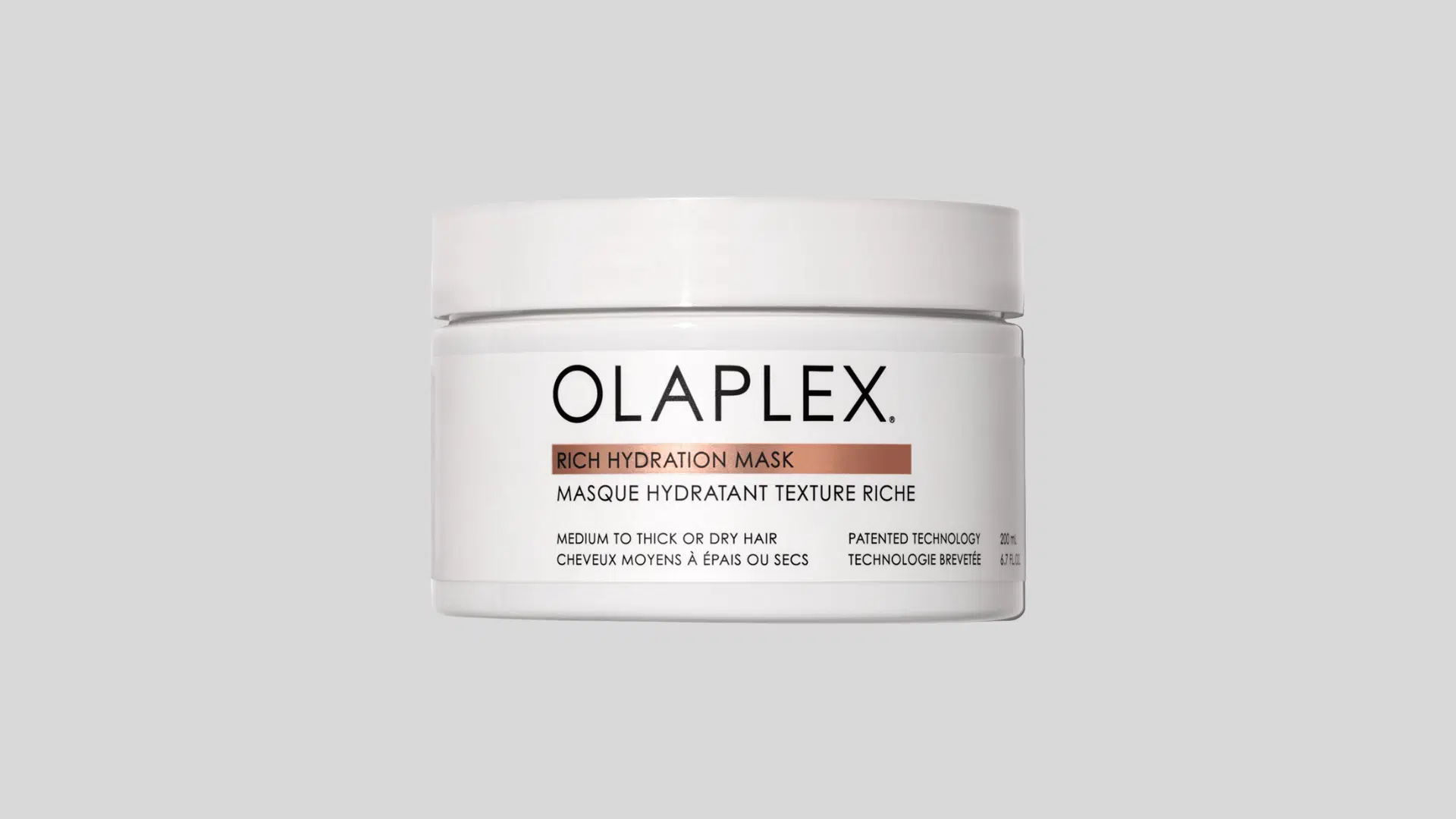 Olaplex Rich Hydration Mask jar on a plain gray background for dry, medium, and thick hair
