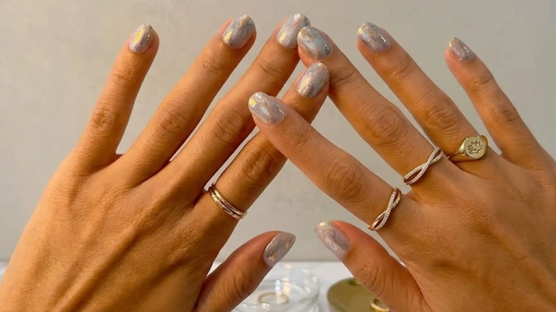 Prism Light Nails in soft iridescent chrome, subtle shimmer finish, glossy look, minimal elegant nail design