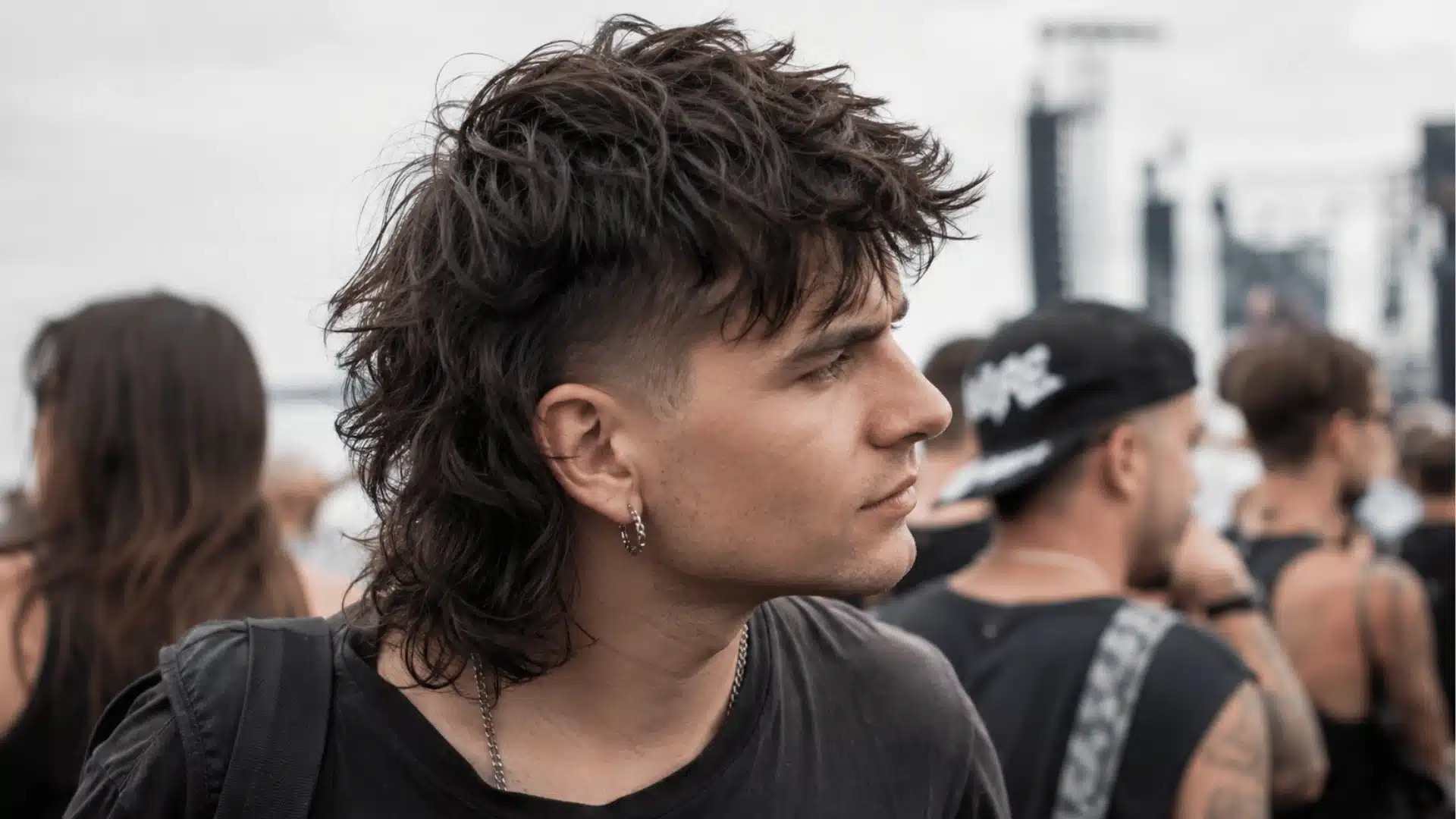 Shaggy skin fade mullet with messy layered texture
