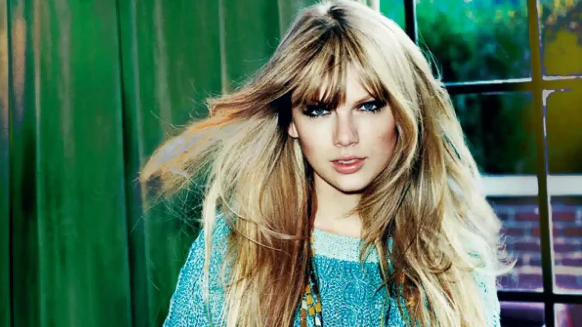 Taylor Swift with soft blonde hair wearing teal outfit, showcasing light summer palette with cool, airy tones and gentle contrast