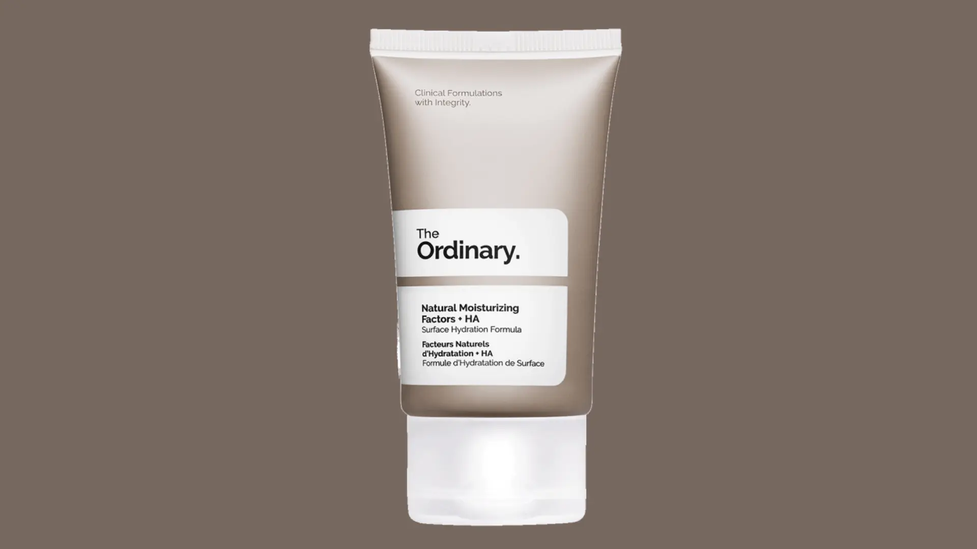 The Ordinary Natural Moisturizing Factors + HA tube on a solid taupe background