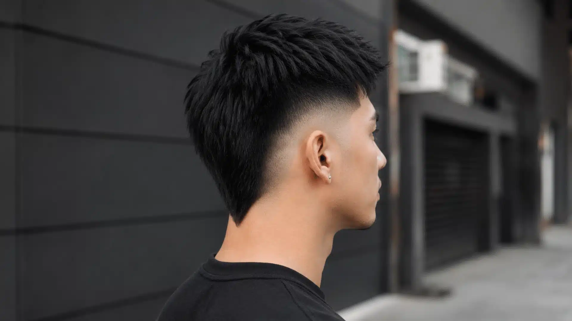 V-shaped skin fade mullet with pointed neckline detail