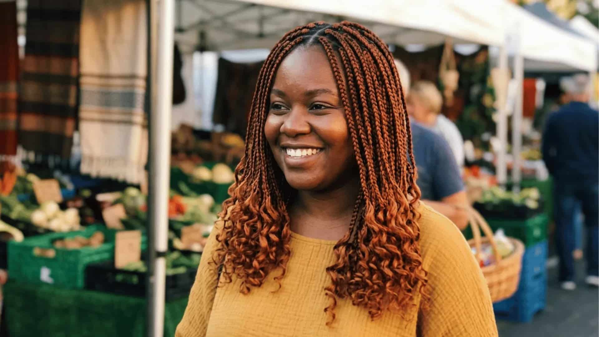 Ginger and Auburn Boho Braid style with loose curly ends in copper tones
