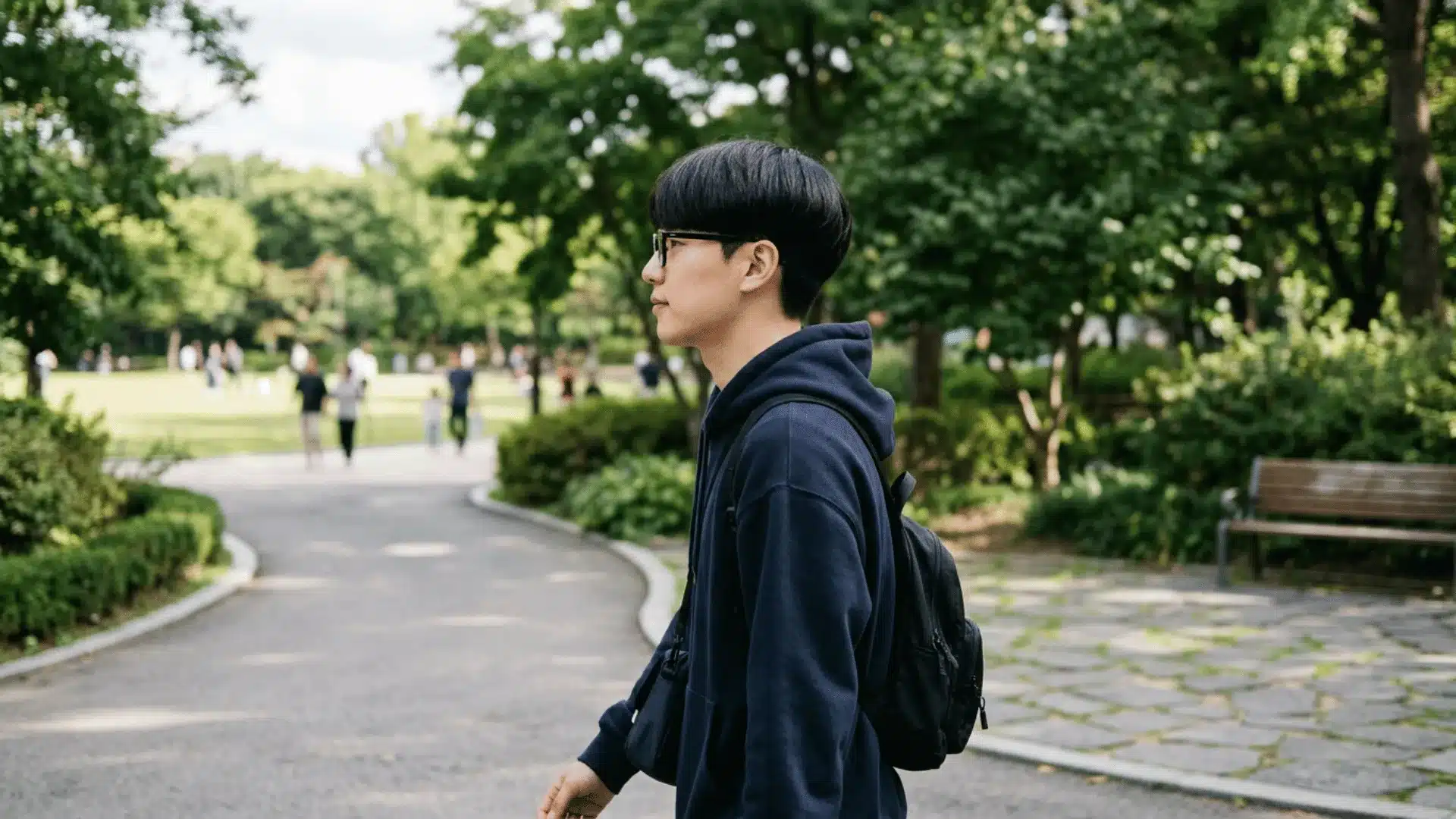 Man with bowl cut perm showing soft rounded shape with natural bounce and movement