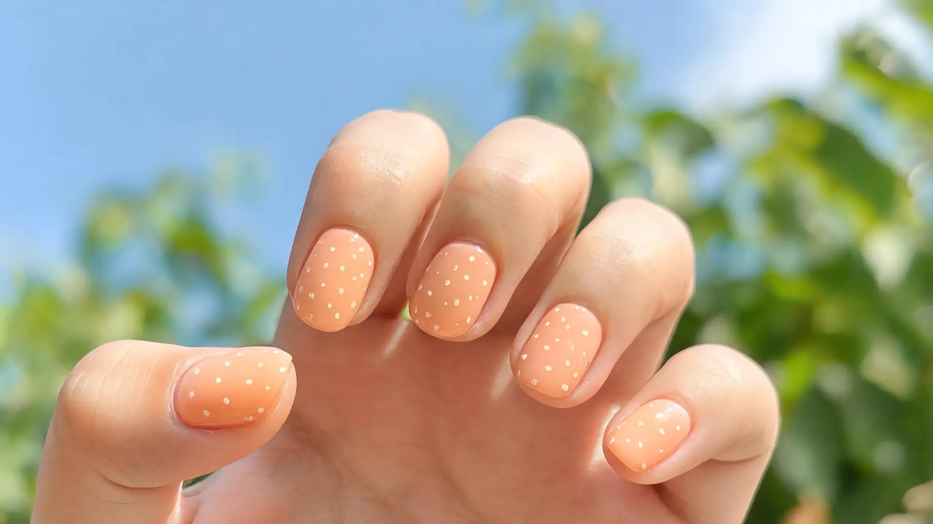 Minimal light orange nails