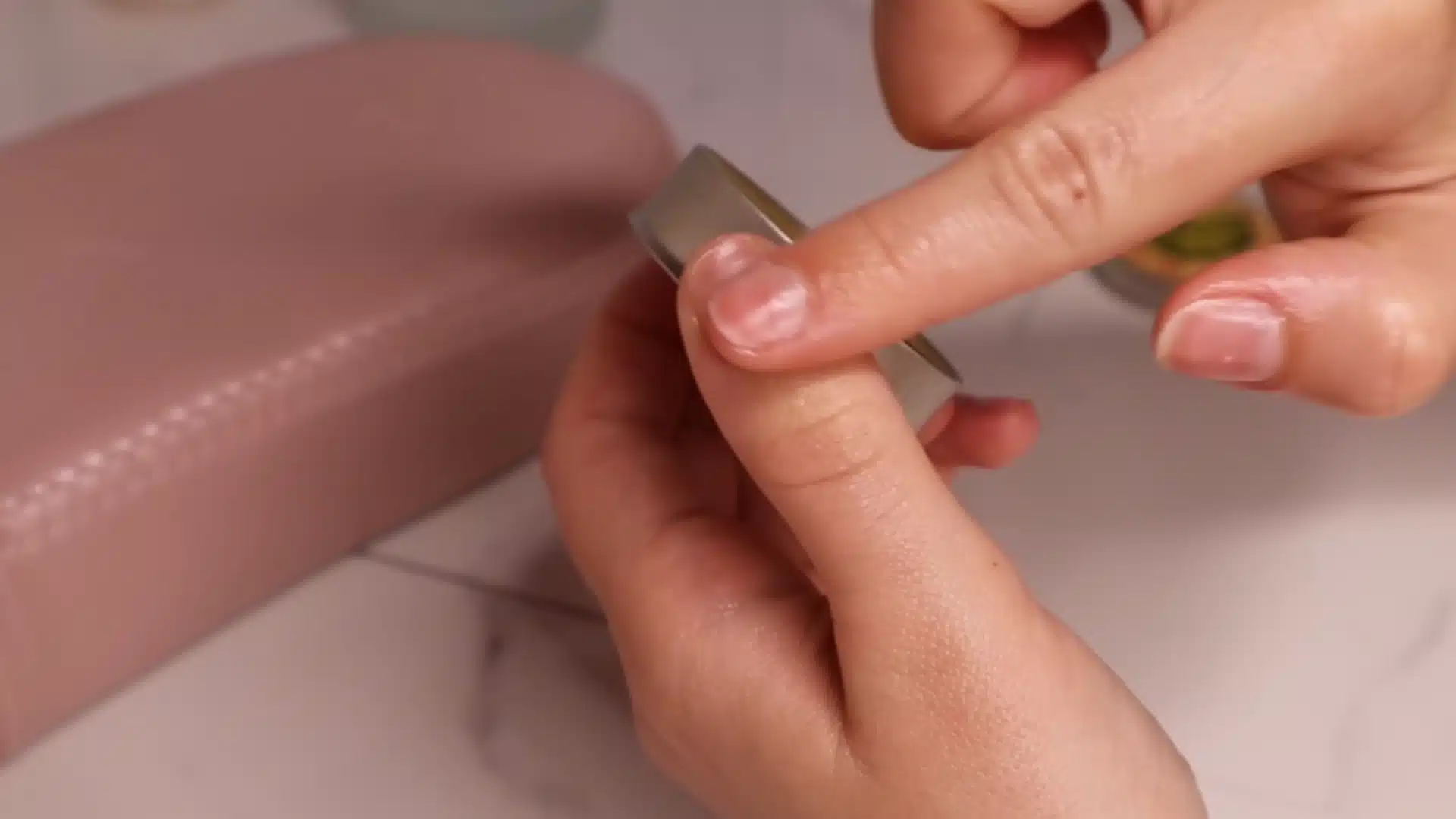 Moisturize nails with cream and cuticle oil to keep cuticles soft and healthy