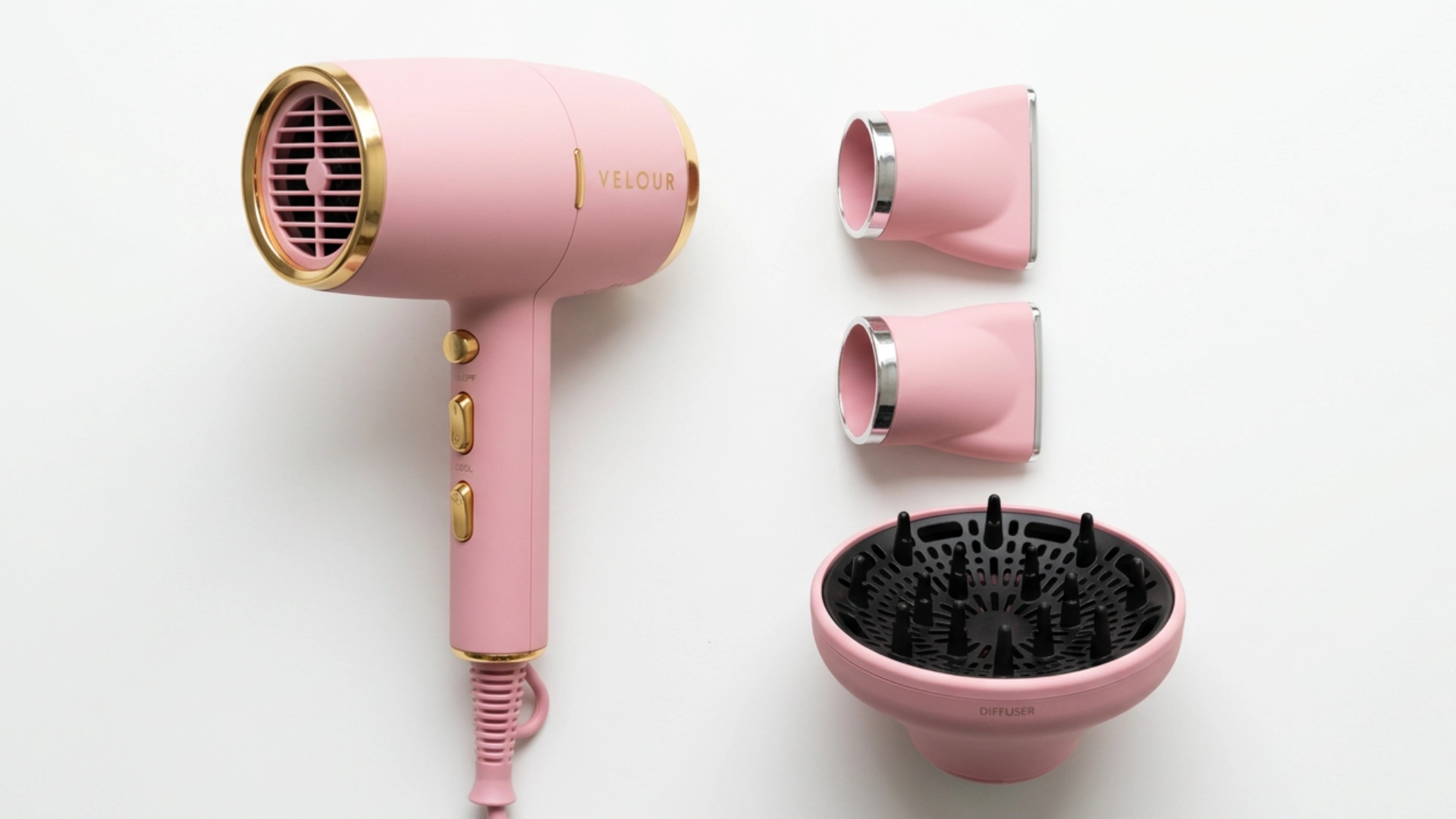 Pink hair dryer with diffuser and styling attachments