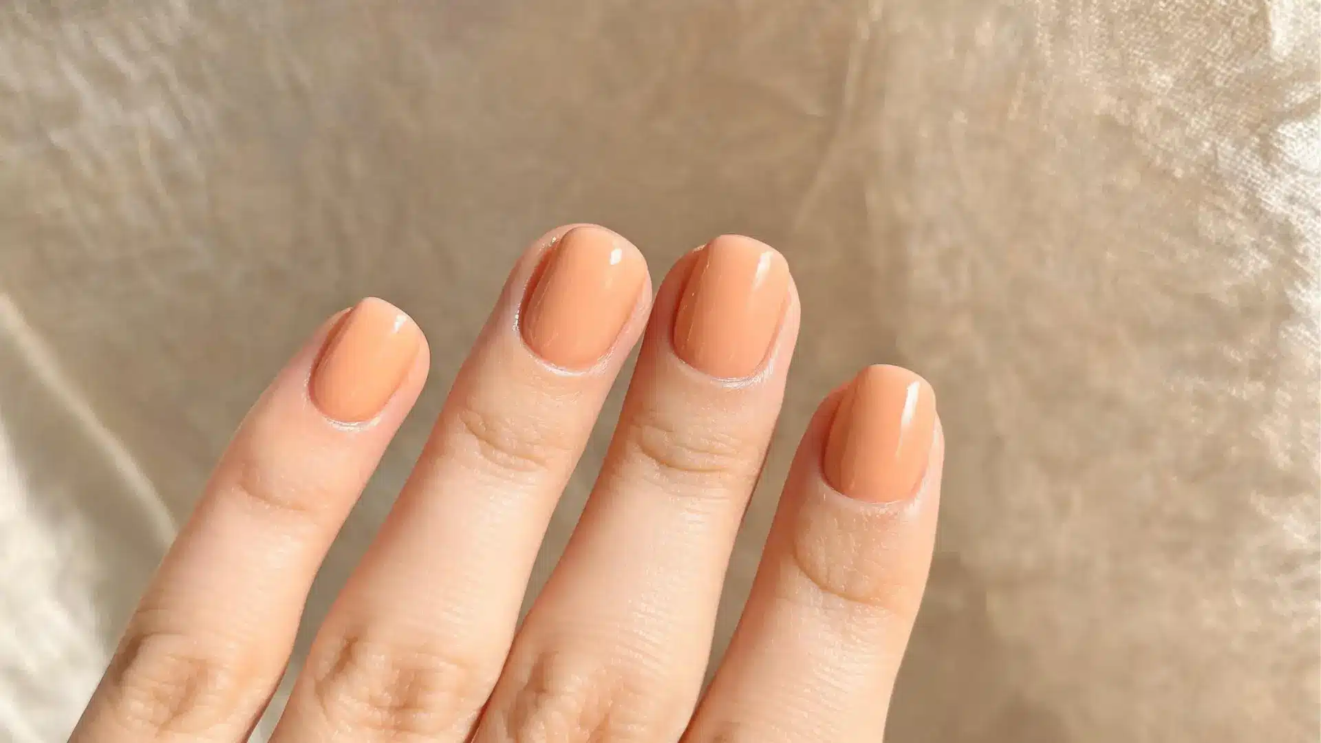 Soft light peach orange nails