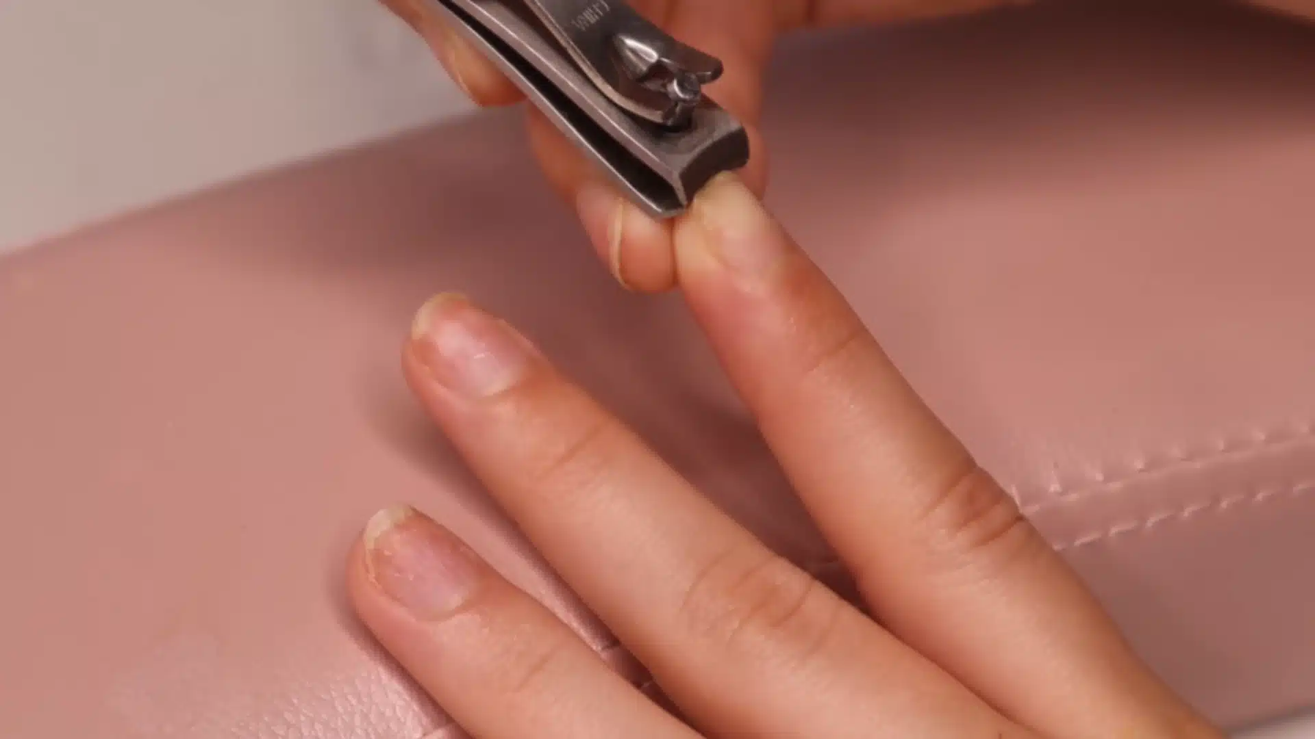 Trim and clean your nails first using clippers before starting beginner cuticle care