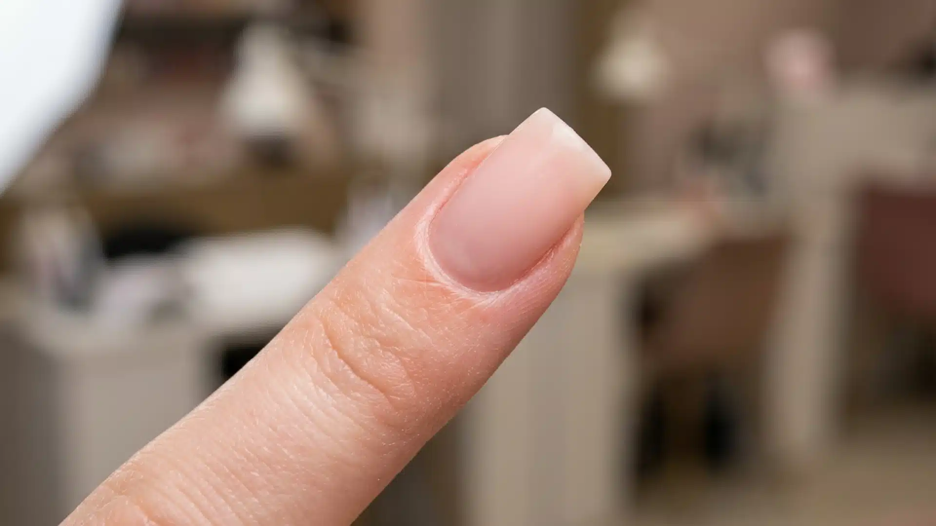 Close-up of a square nail shape with flat tip and sharp right-angle corners