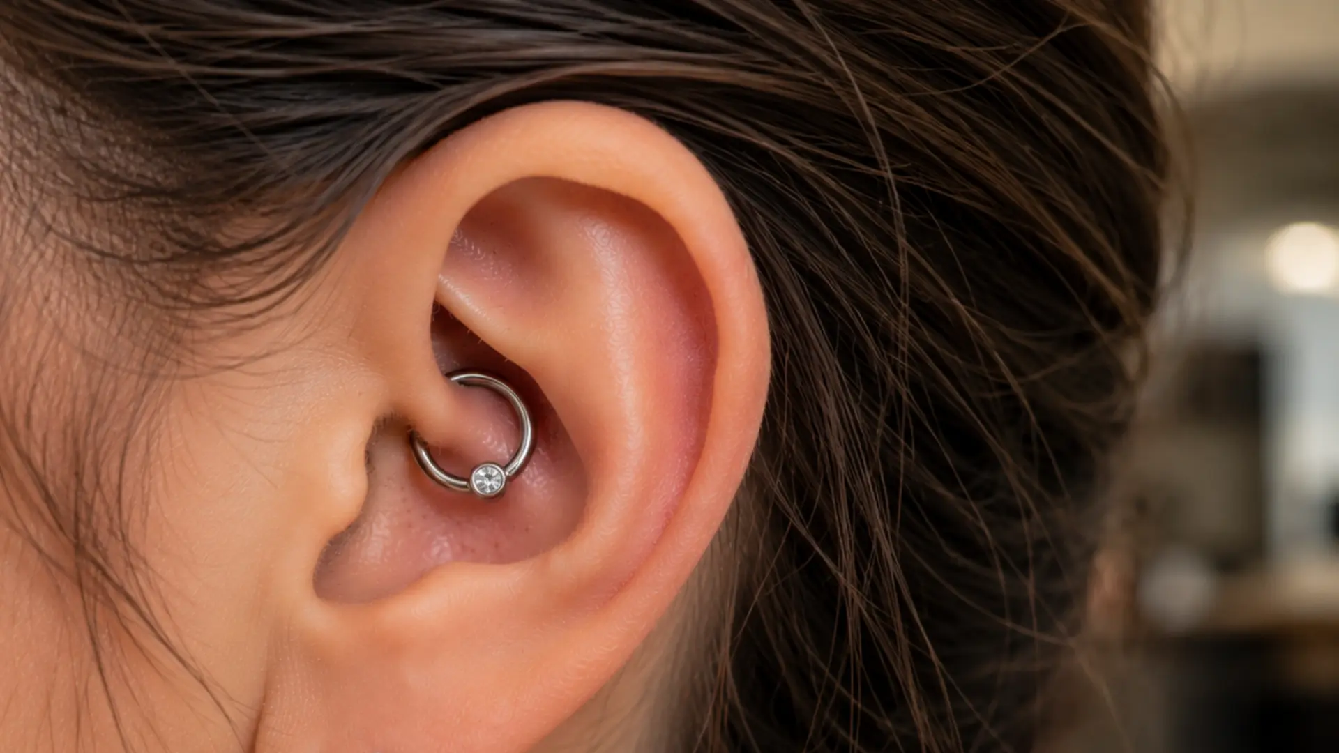 Decorative daith cartilage piercing
