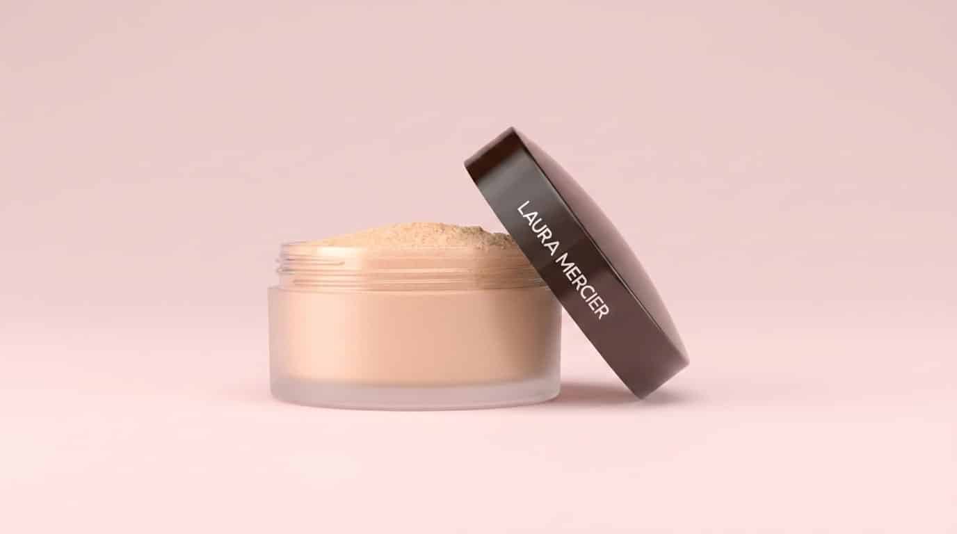 laura mercier translucent loose setting powder shown in its cosmetic powder container