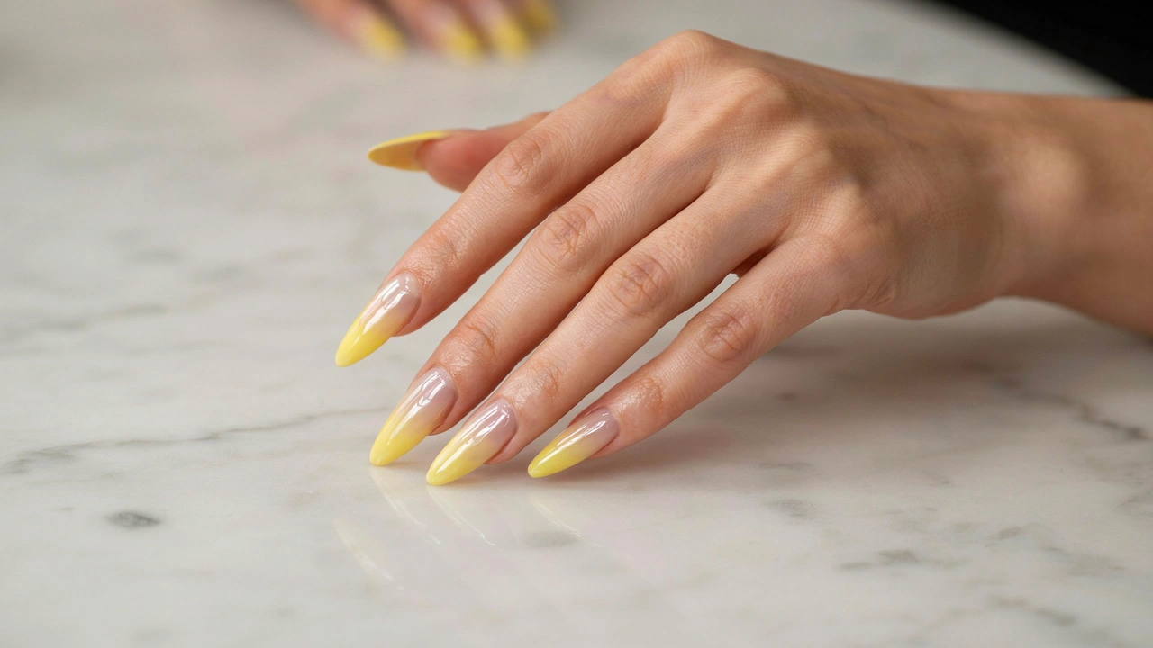 long stiletto yellow gradient chrome nails fading into a white base