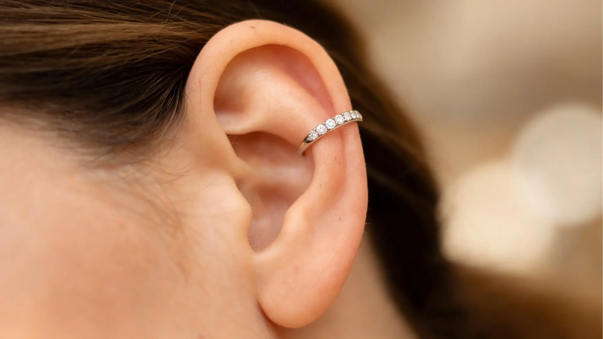 Outer conch piercing with hoop