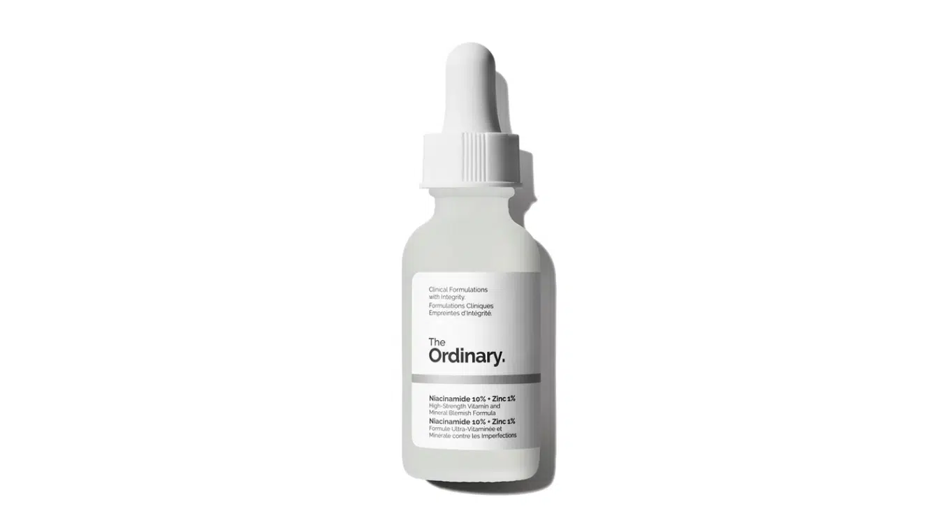 the ordinary niacinamide zinc serum bottle on white background