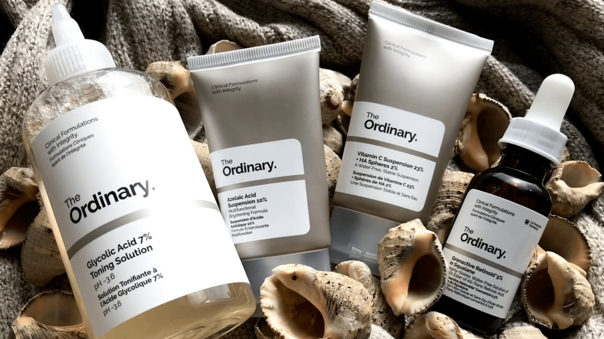The Ordinary retinoid, vitamin C and acid products displayed together for a core skincare routine