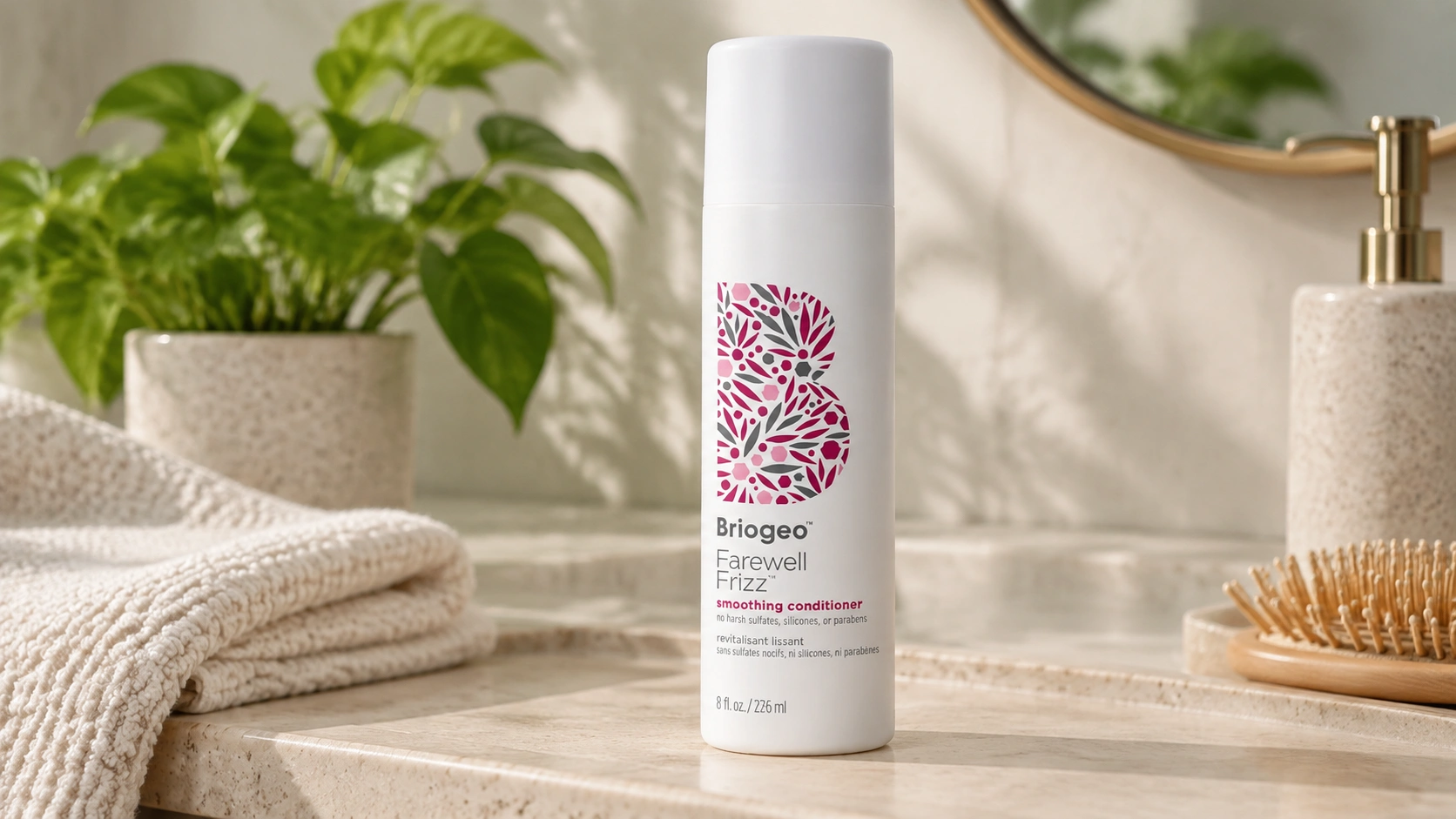 briogeo farewell frizz smoothing conditioner bottle in a matte bathroom product photoshoot setting