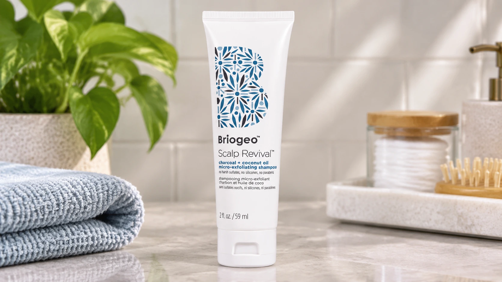 briogeo scalp revival shampoo tube on a clean bathroom vanity counter setup